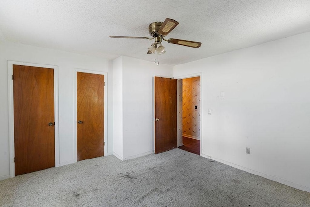221 Lakeview Dr, Liberty, SC 29657 - unfurnished bedroom featuring baseboards, a ceiling fan, a textured ceiling, and carpet
