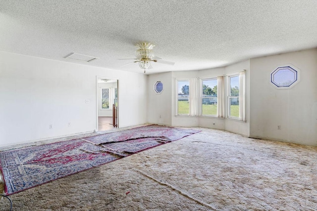 221 Lakeview Dr, Liberty, SC 29657 - carpeted spare room featuring a textured ceiling and ceiling fan