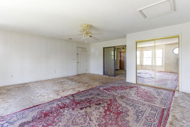 221 Lakeview Dr, Liberty, SC 29657 - unfurnished room featuring attic access, a ceiling fan, carpet flooring, and a textured ceiling