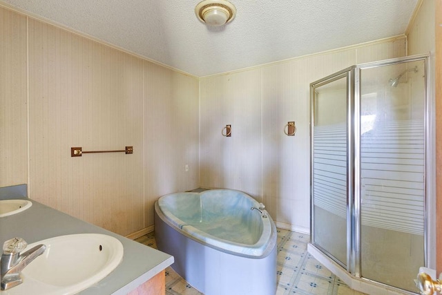 221 Lakeview Dr, Liberty, SC 29657 - bathroom with a shower stall, a washtub, a sink, and a textured ceiling
