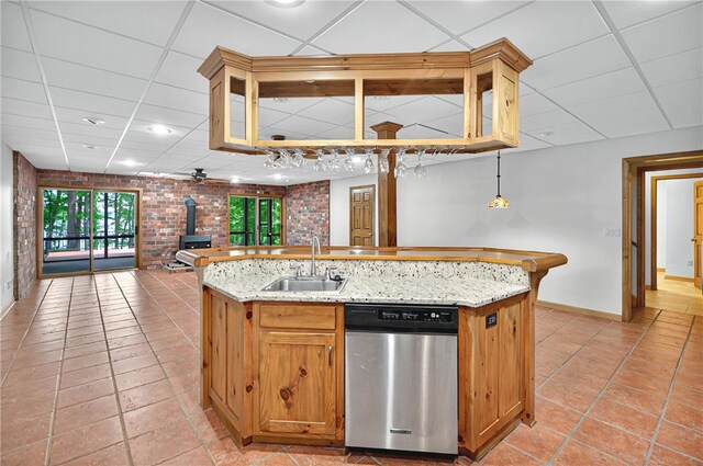 234 Chandlers Ferry Dr, Hartwell, GA 30643 - kitchen with dishwasher, a sink, a wood stove, and a drop ceiling