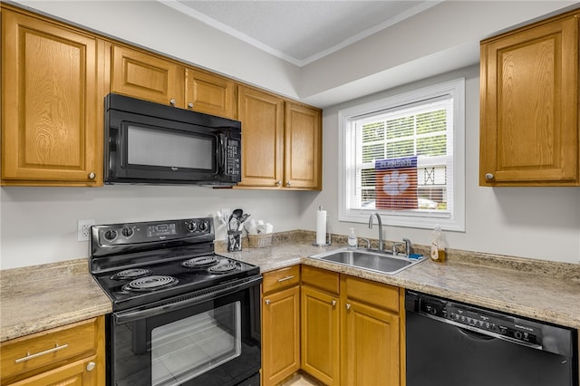 kitchen featuring a sink, light countertops, crown molding, and black appliances