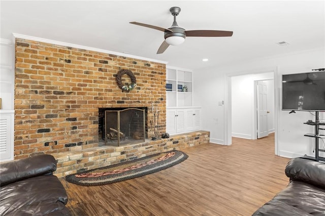 112 Briar Creek Ln, Anderson, SC 29621 - living room featuring crown molding, wood finished floors, a ceiling fan, and baseboards