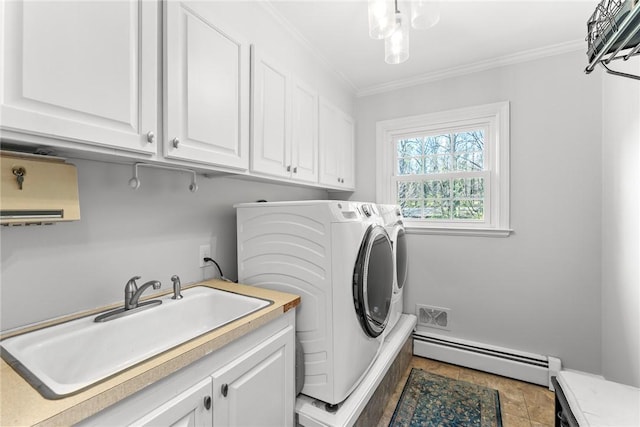 112 Briar Creek Ln, Anderson, SC 29621 - washroom featuring washing machine and clothes dryer, a sink, a baseboard radiator, cabinet space, and ornamental molding