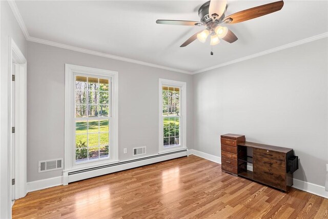 112 Briar Creek Ln, Anderson, SC 29621 - unfurnished room featuring a baseboard heating unit, wood finished floors, visible vents, and ornamental molding