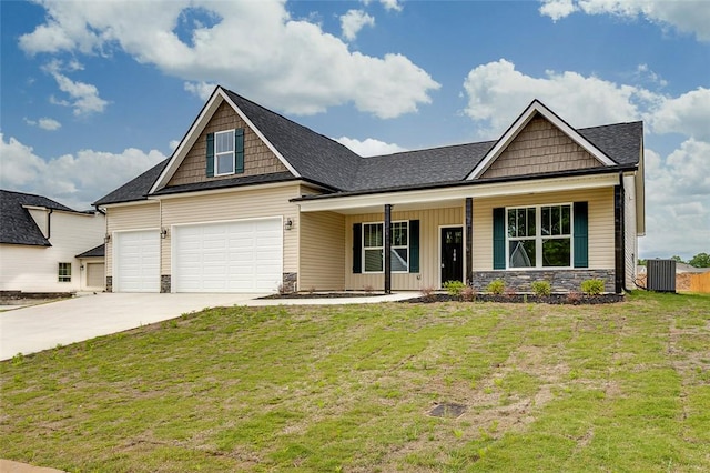craftsman house with stone siding, a porch, concrete driveway, a front lawn, and central AC