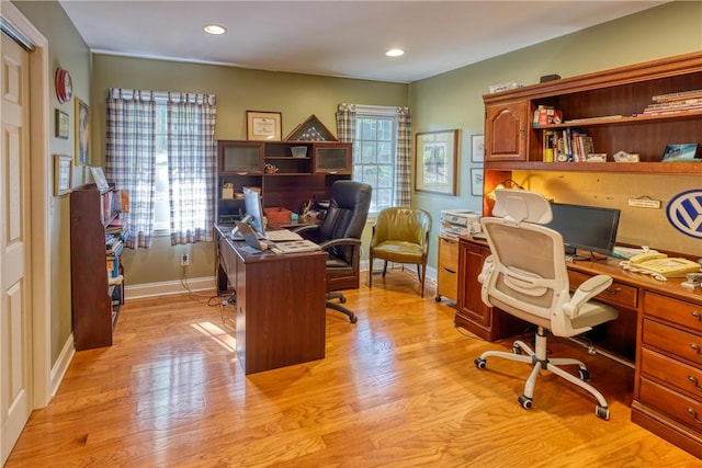 home office featuring recessed lighting, light wood finished floors, and baseboards