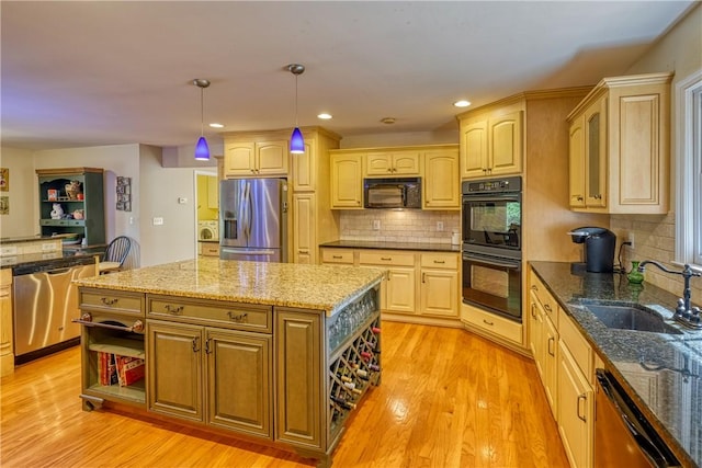 kitchen with open shelves, a sink, light wood-type flooring, and black appliances