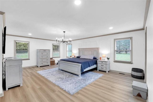 bedroom featuring light wood-type flooring, baseboards, an inviting chandelier, and crown molding
