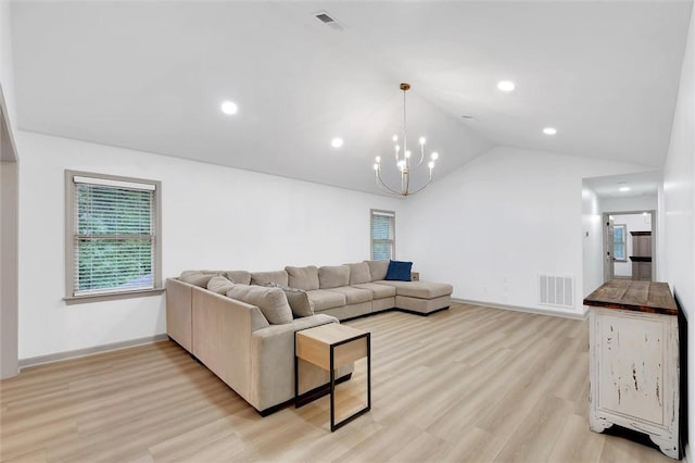 living area with recessed lighting, lofted ceiling, visible vents, light wood-type flooring, and a notable chandelier