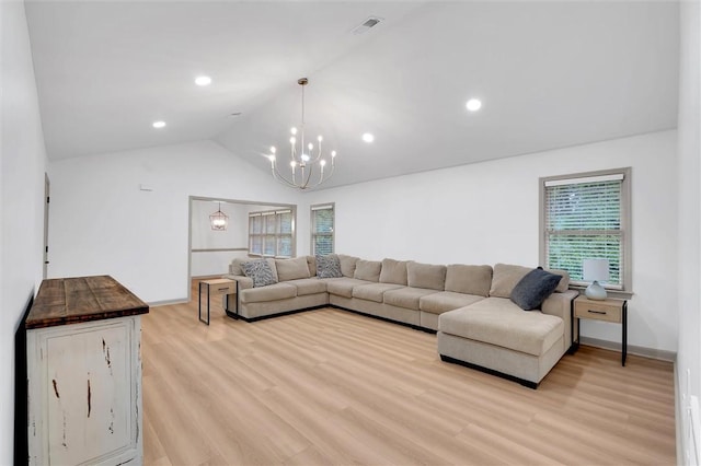 living room with light wood-type flooring, vaulted ceiling, visible vents, an inviting chandelier, and recessed lighting