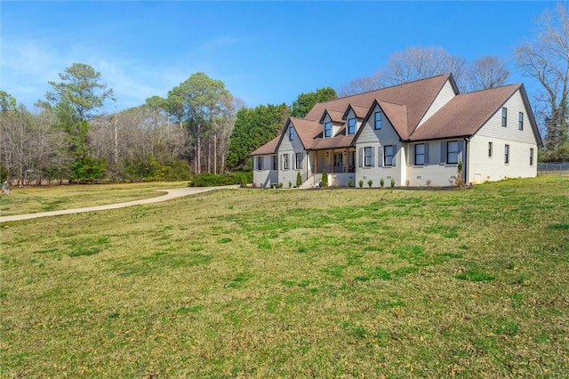 view of front of home with a front yard
