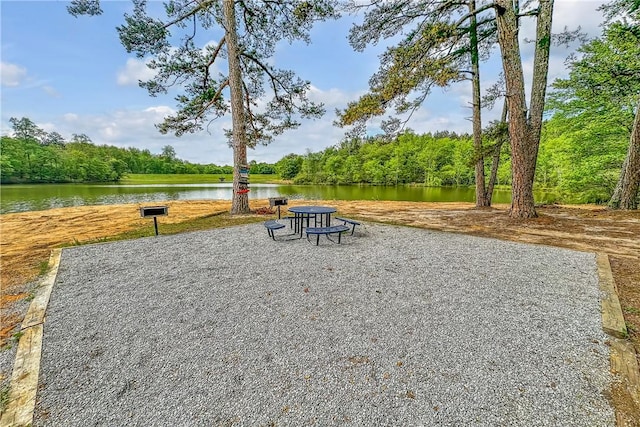 surrounding community featuring a water view