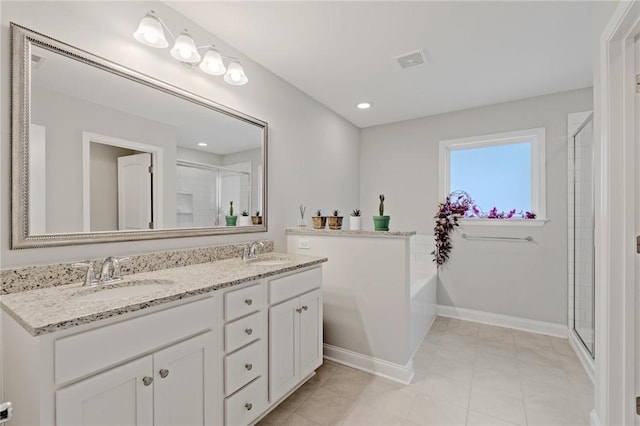 full bath featuring double vanity, a sink, visible vents, and a stall shower