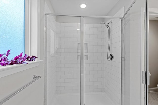 full bath with a shower stall and recessed lighting