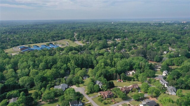 bird's eye view featuring a view of trees