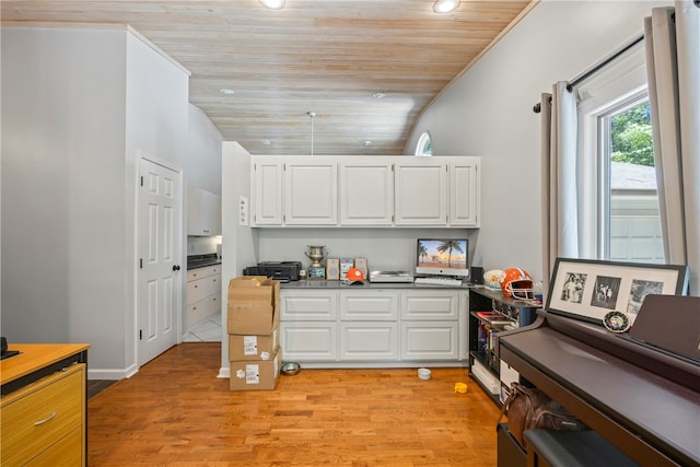 kitchen featuring white cabinets, light wood-type flooring, wooden ceiling, lofted ceiling, and recessed lighting