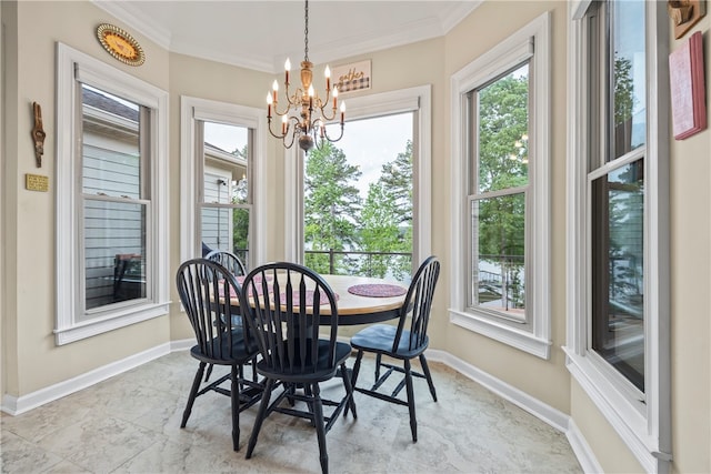 dining room featuring ornamental molding, an inviting chandelier, and plenty of natural light