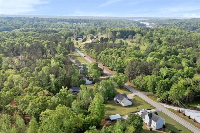 aerial view featuring a view of trees