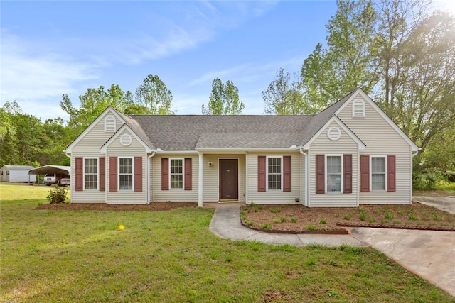 ranch-style home with a front lawn and a shingled roof