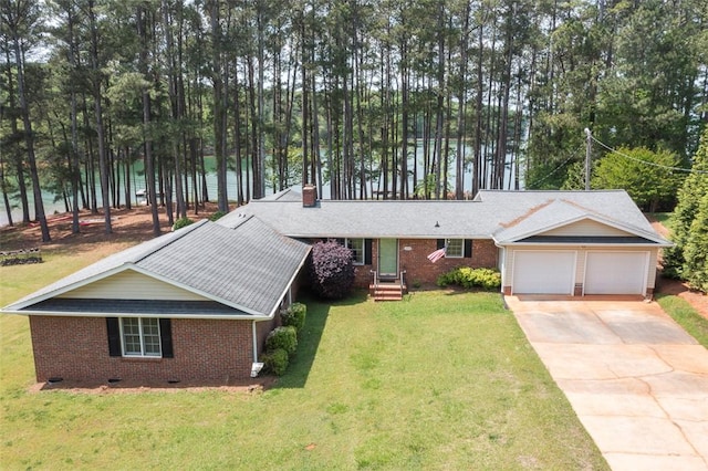 single story home featuring brick siding, an attached garage, concrete driveway, and crawl space