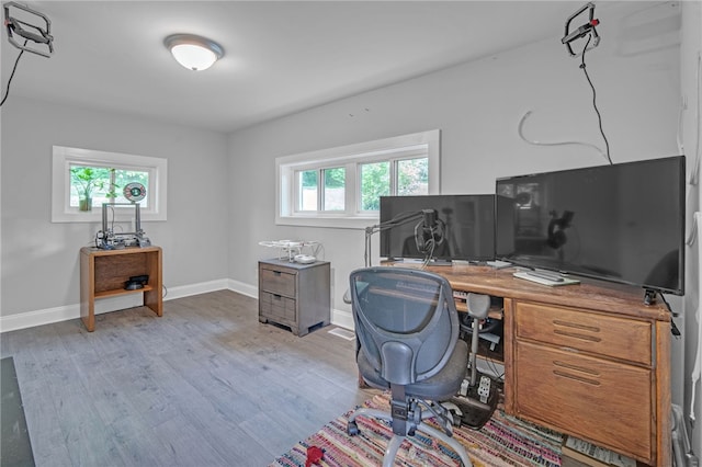 office featuring wood finished floors and baseboards