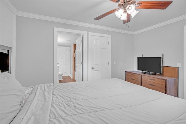 bedroom with ensuite bathroom, crown molding, and a ceiling fan