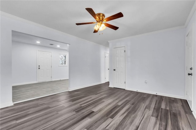 unfurnished living room with ornamental molding, ceiling fan, wood finished floors, and baseboards