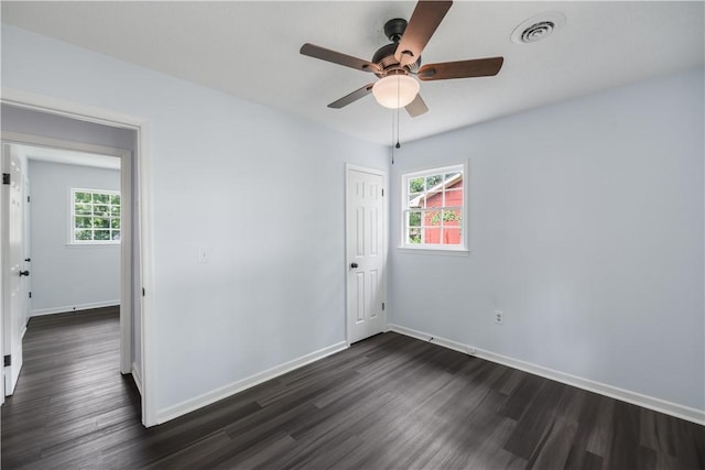 1004 Gilreath Rd, Anderson, SC 29621 - unfurnished room with dark wood-style flooring, baseboards, and a ceiling fan