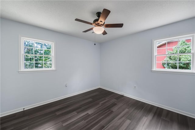 1004 Gilreath Rd, Anderson, SC 29621 - empty room with dark wood-style floors, ceiling fan, baseboards, and a textured ceiling