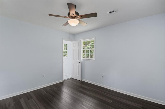 1004 Gilreath Rd, Anderson, SC 29621 - empty room with dark wood-style floors, baseboards, and ceiling fan