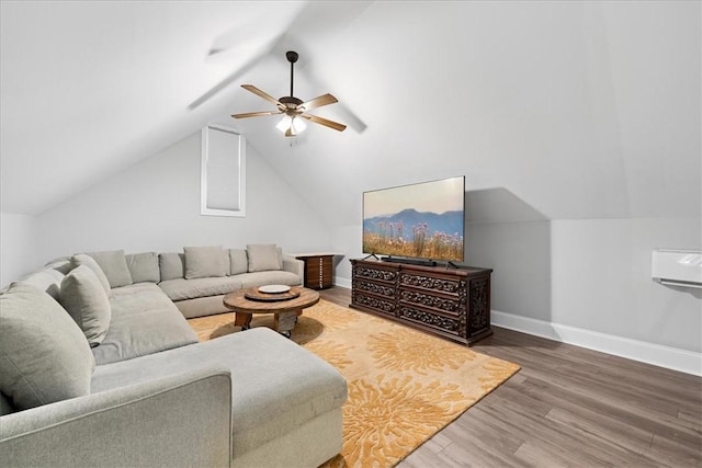living room featuring lofted ceiling, wood finished floors, a ceiling fan, and baseboards
