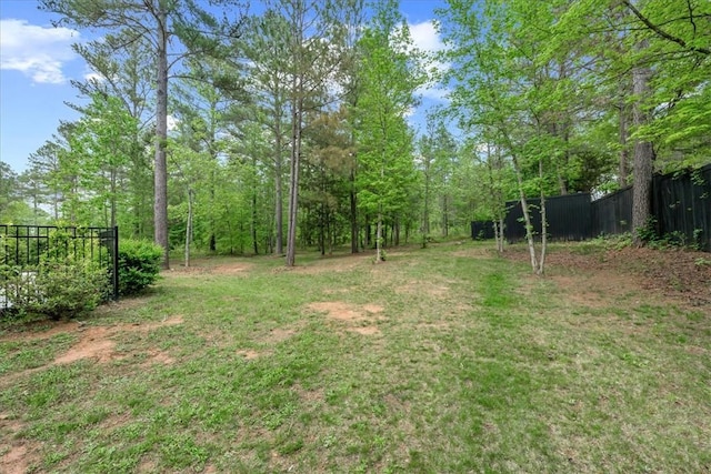 view of yard with fence