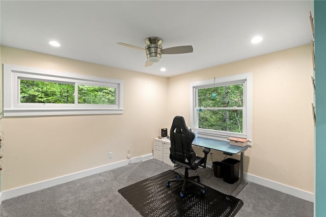 carpeted office featuring recessed lighting, ceiling fan, baseboards, and a healthy amount of sunlight