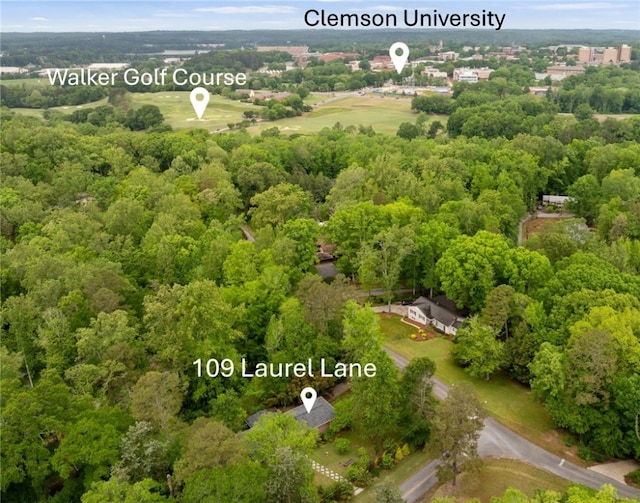bird's eye view featuring a view of trees