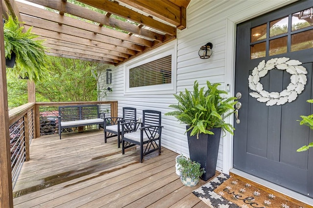 wooden deck with a pergola