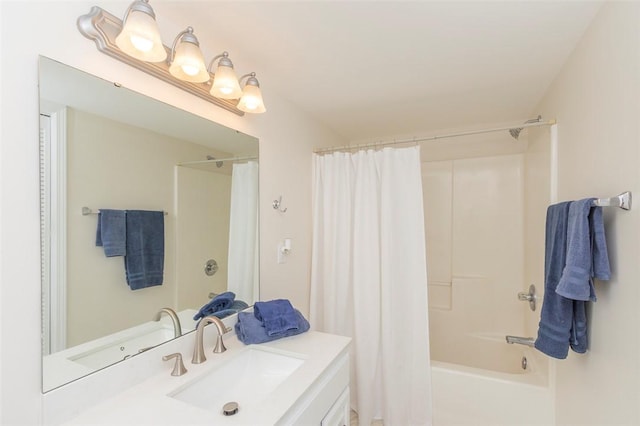 full bath featuring shower / bath combo with shower curtain and vanity