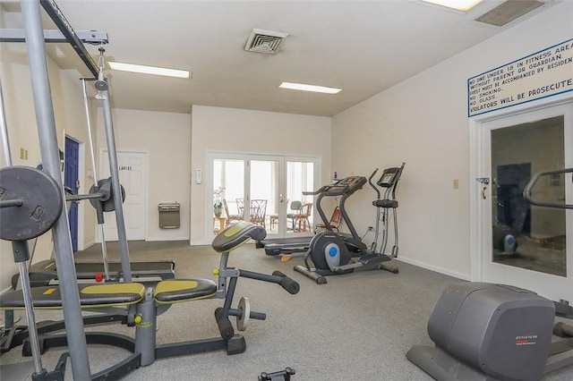 workout area featuring visible vents, french doors, and baseboards