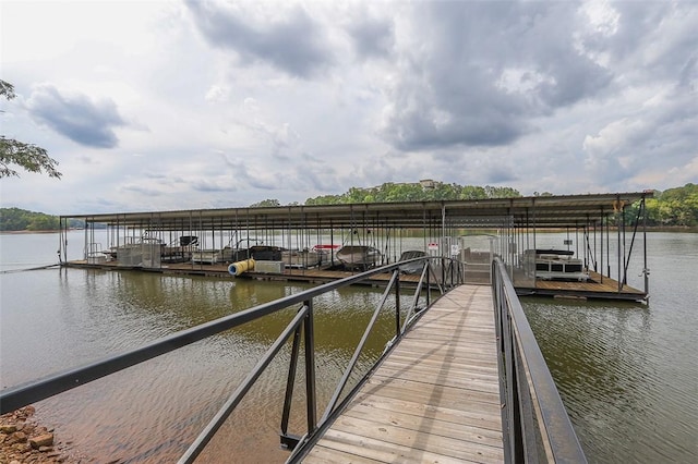 dock area featuring a water view