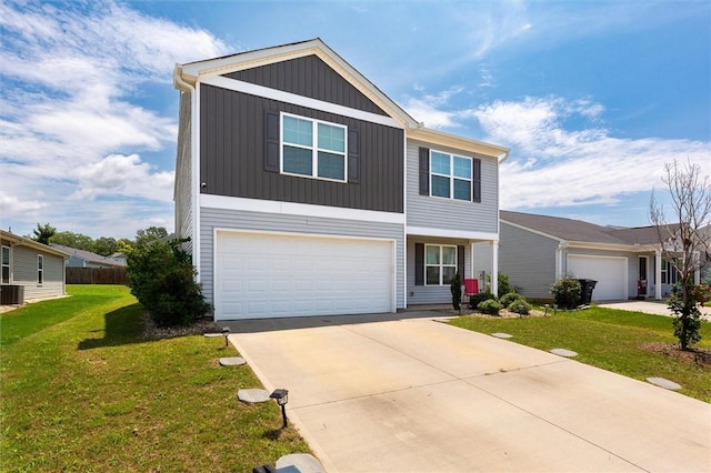 view of front of home with driveway, central air condition unit, a front lawn, and a garage