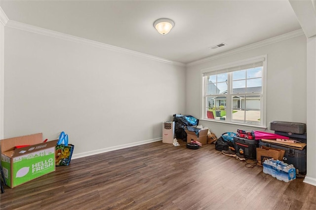 game room featuring ornamental molding, visible vents, wood finished floors, and baseboards