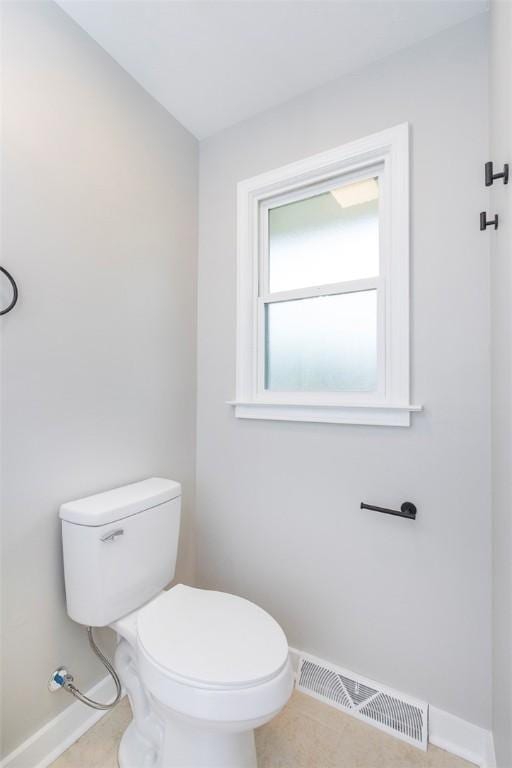 4082 Old Portman Rd, Anderson, SC 29626 - half bath with toilet, tile patterned flooring, visible vents, and baseboards