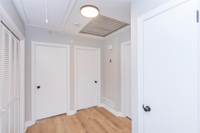 4082 Old Portman Rd, Anderson, SC 29626 - corridor featuring baseboards, visible vents, attic access, and light wood-style flooring