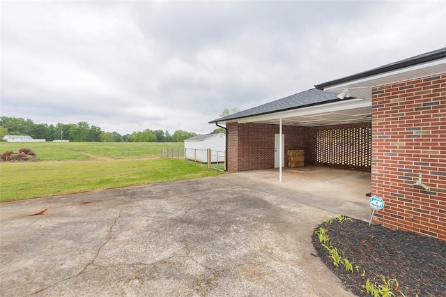 4082 Old Portman Rd, Anderson, SC 29626 - view of patio featuring driveway, fence, and a carport