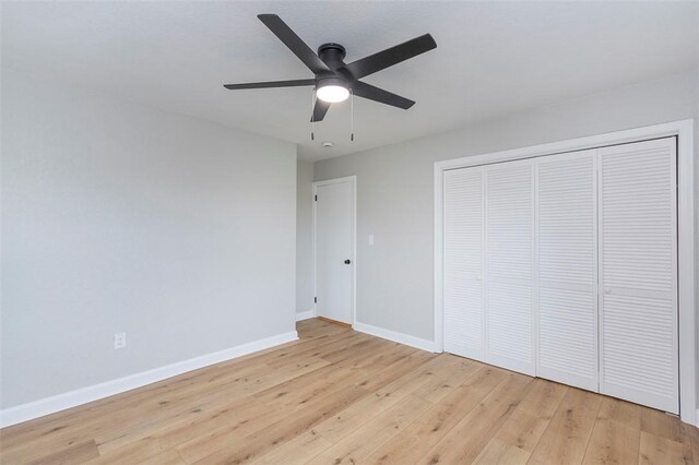 4082 Old Portman Rd, Anderson, SC 29626 - unfurnished bedroom with a closet, a ceiling fan, baseboards, and light wood-type flooring