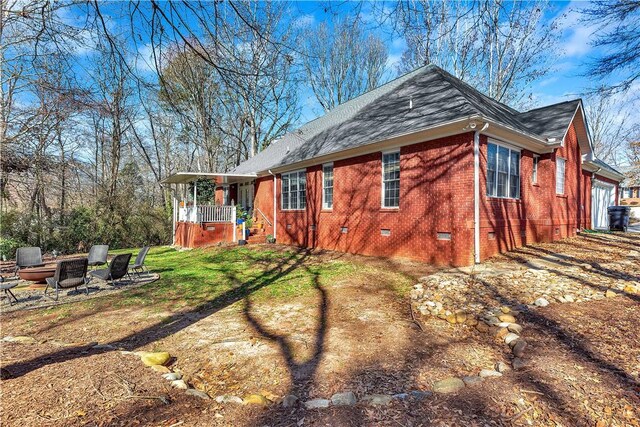 307 Brittany Park, Anderson, SC 29621 - back of property with crawl space, an outdoor fire pit, roof with shingles, and brick siding