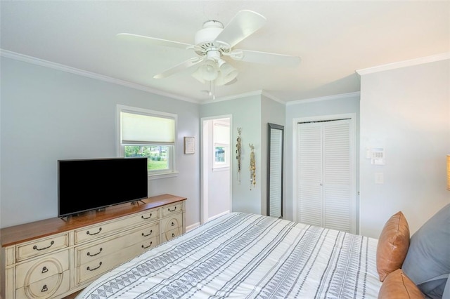 bedroom featuring ceiling fan, crown molding, and a closet