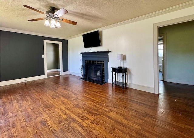 unfurnished living room with crown molding, a textured ceiling, and a ceiling fan