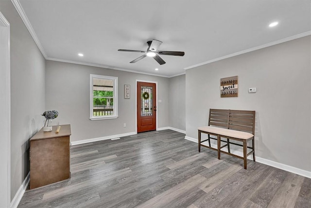 foyer entrance featuring crown molding, recessed lighting, ceiling fan, and dark wood finished floors