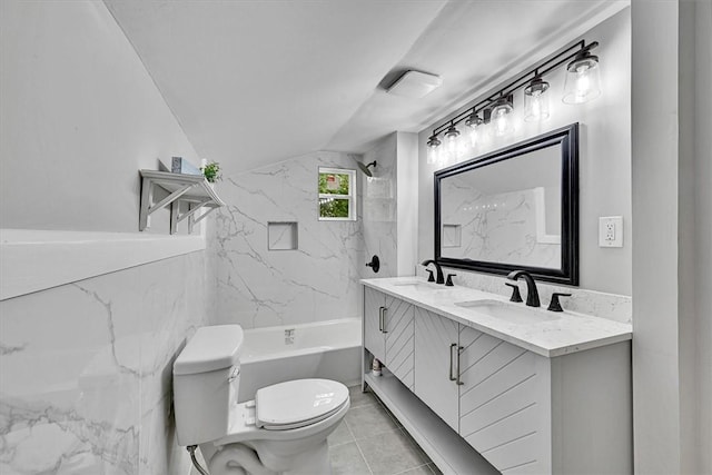 full bathroom featuring double vanity, shower / washtub combination, toilet, and a sink